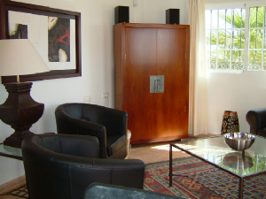 Elegant sunny lounge viewed from kitchen