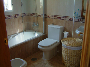 Upstairs main bathroom incl bidet and view to the lake